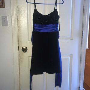 a black dress with a blue ribbon